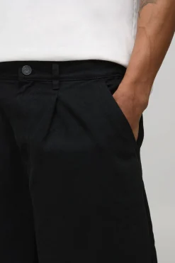 Pantalon en sergé lavé à coupe ballon et ceinture bicolore