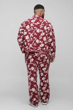 Pantalon flare empilé à tapisserie florale en grande taille