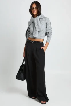 Pantalon fluide à jambes larges avec ceinture
