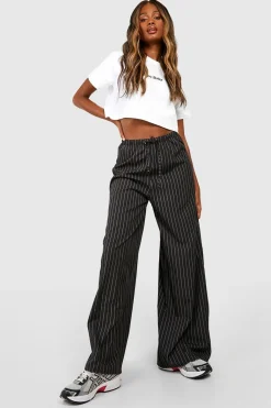Pantalon fluide à rayures et jambes larges