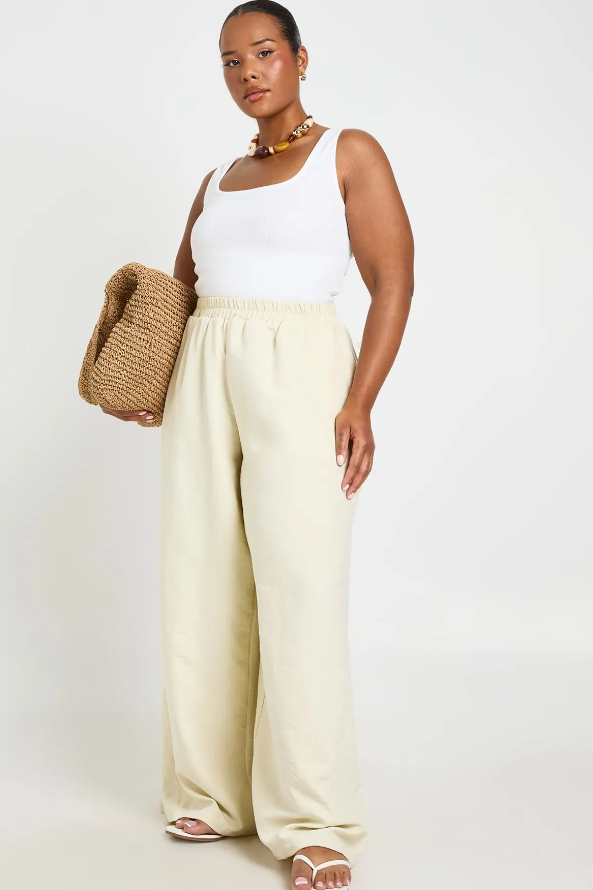 Pantalon Grande Taille À Jambes Larges Avec Taille Élastiquée Et Finition Peau De Pêche