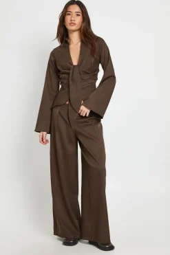 Pantalon à jambes larges aux détails de plis