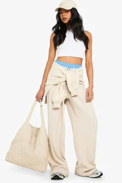 Pantalon à jambes larges avec ceinture à rayures contrastées