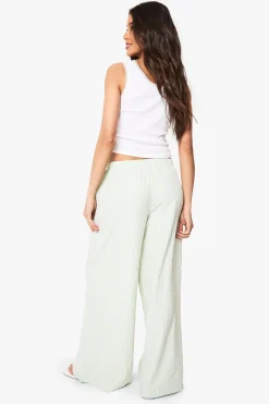 Pantalon à jambes larges avec détails boutons rayés