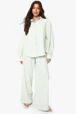 Pantalon à jambes larges avec détails boutons rayés