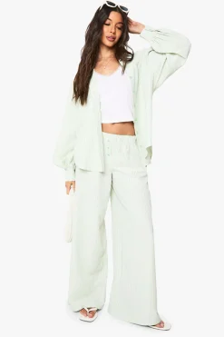 Pantalon à jambes larges avec détails boutons rayés