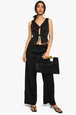 Pantalon à jambes larges effet lin avec taille nouée