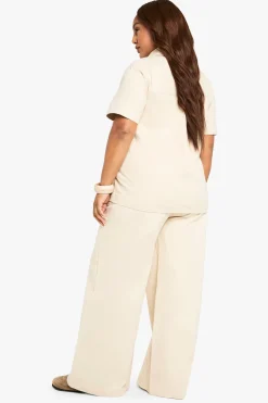 Pantalon à jambes larges en sergé de coton avec taille à cordon
