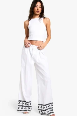 boohoo Pantalon à jambes larges et longues avec broderie sur l'ourlet<Femme Pantalons