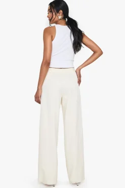 Pantalon à jambes larges sur mesure avec ourlet effiloché