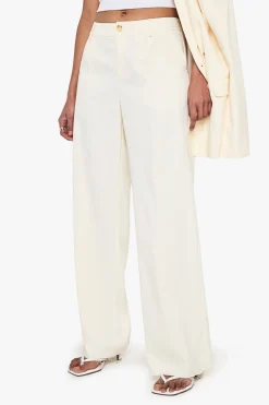 Pantalon à jambes larges sur mesure avec ourlet effiloché