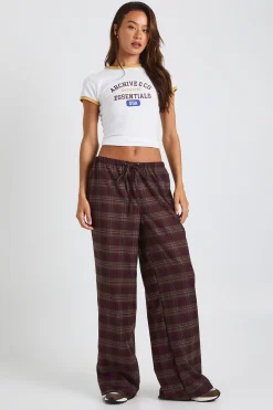 Pantalon à jambes larges à taille cordon avec motif à carreaux grand format