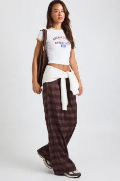 Pantalon à jambes larges à taille cordon avec motif à carreaux grand format