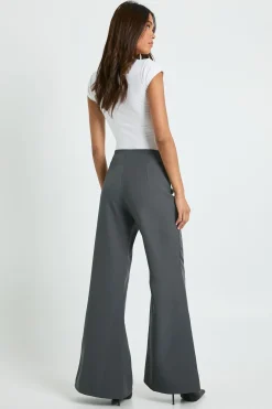 Pantalon à ourlet fendu et jambes évasées
