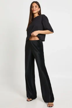 Pantalon plissé taille mi-haute à jambes larges
