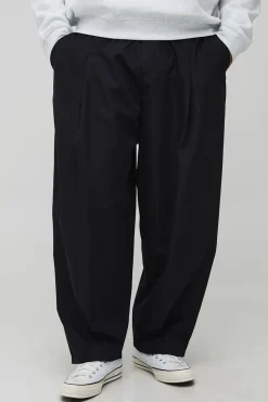 Pantalon à plis supplémentaires à l'avant, coupe ballon