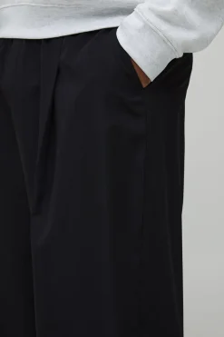 Pantalon à plis supplémentaires à l'avant, coupe ballon