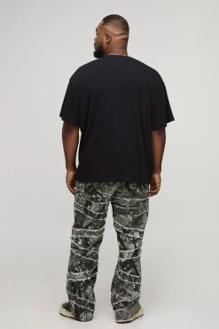 Pantalon Plus à imprimé camouflage, coupe skinny flare, bord brut et appliqué