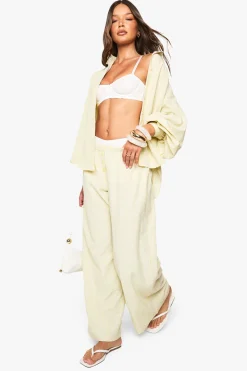 boohoo Pantalon rayé à jambe large avec détail bouton<Femme Pantalons