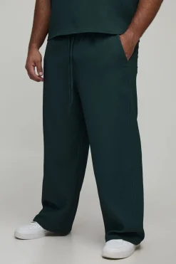 Pantalons plissés à jambes larges