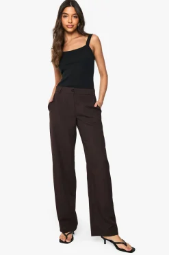 Pantalon taille basse, coupe slim, jambe en forme de tonneau