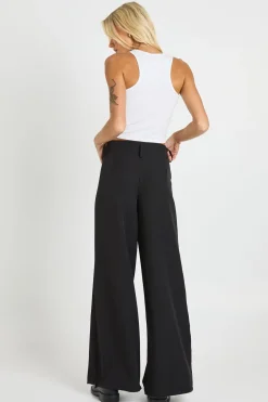 Pantalon taille basse à jambes larges
