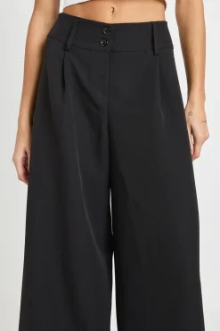 Pantalon taille basse à jambes larges
