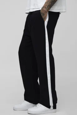 Pantalon taille haute avec élastique, coupe décontractée et panneau latéral.