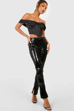 Pantalon à taille mi-haute à paillettes avec ourlet fendu