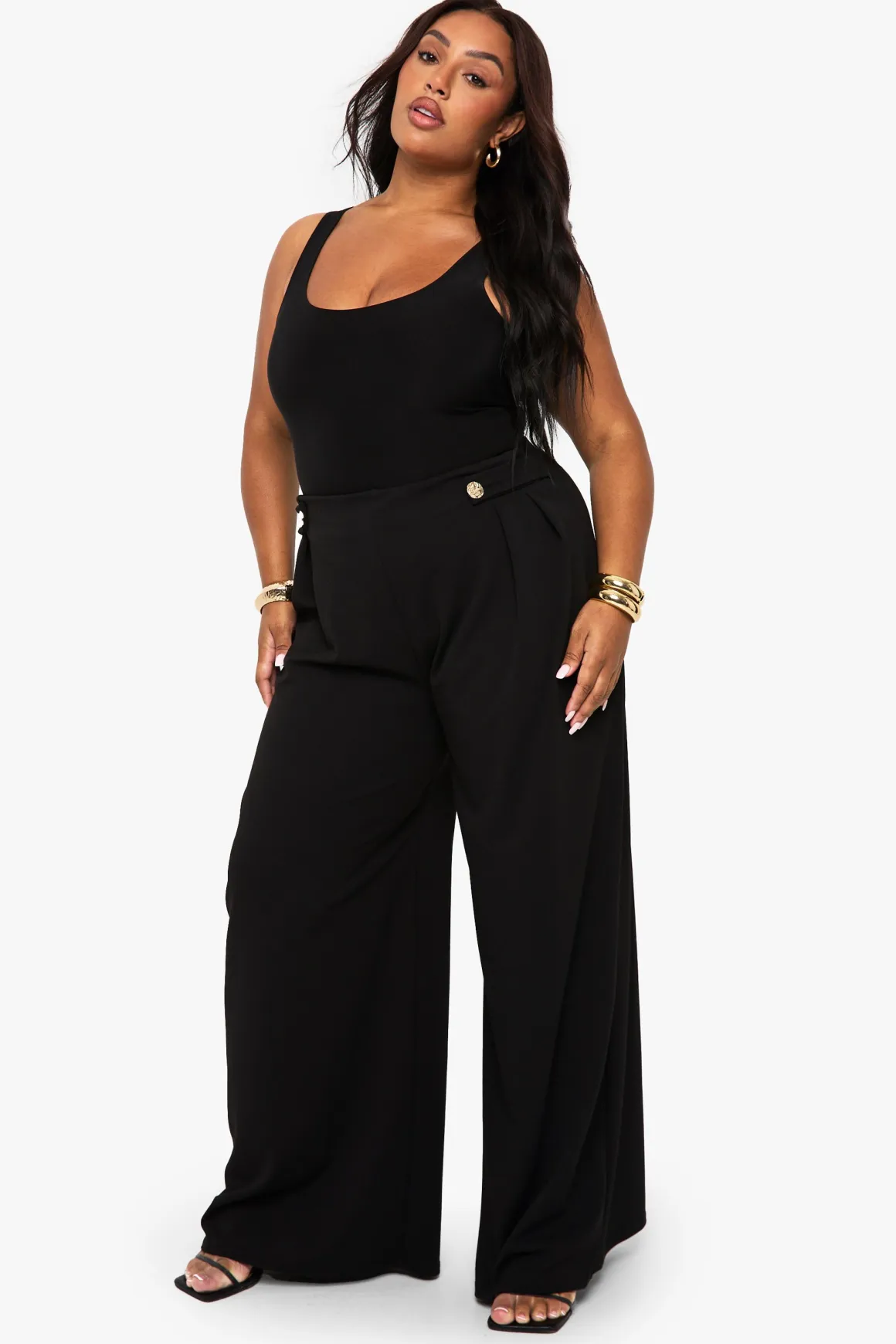 Pantalon tailleur à jambe large, taille élastiquée et garniture dorée