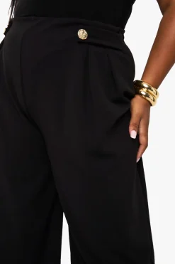 Pantalon tailleur à jambe large, taille élastiquée et garniture dorée