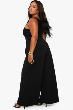 Pantalon tailleur à jambe large, taille élastiquée et garniture dorée