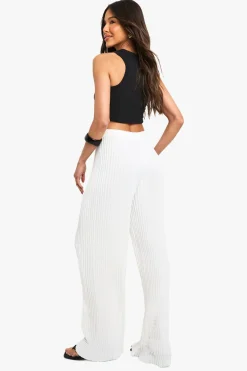 Pantalon tailleur à jambe large et plissé