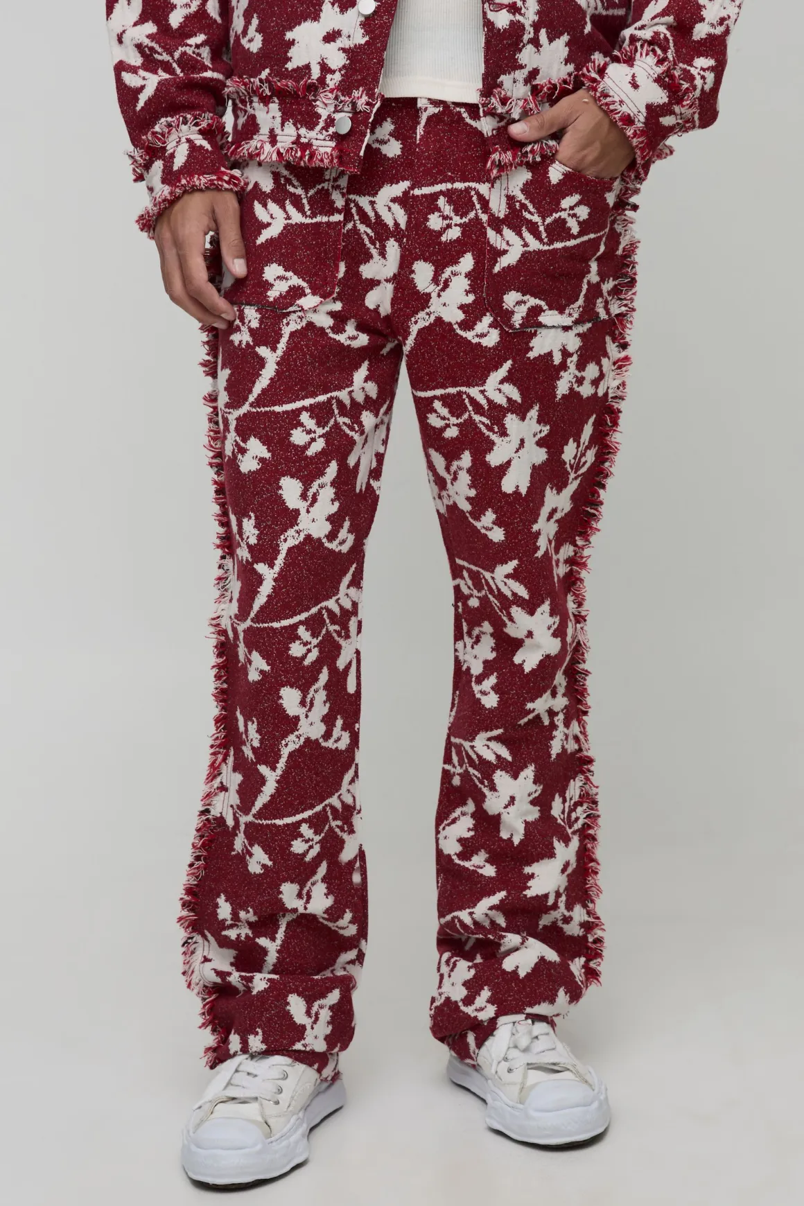 Pantalon tapisserie florale empilé et évasé