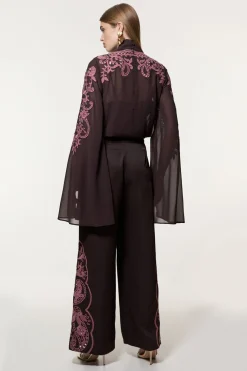 Pantalon tissé en sergé ajouré et perlés à jambe large