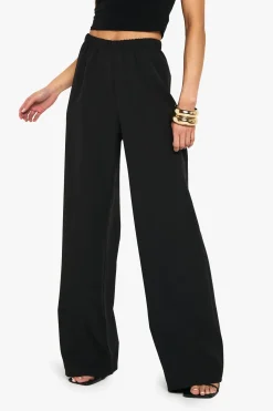 Pantalon tissé à jambes larges et élastiquées