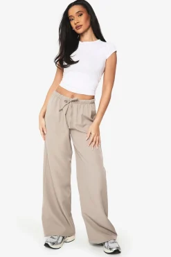 Pantalon tissé élastiqué taille basse à jambes larges