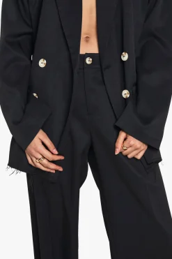Pantalon tissé sur mesure à jambe large et ourlet effiloché