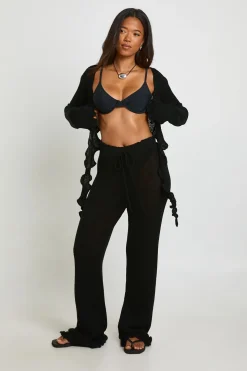 Pantalon Tricoté Transparent À Bords Ondulés