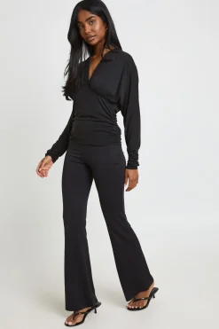 Pantalon Évasé Mat En Slinky Avec Découpes Et Liens Latéraux