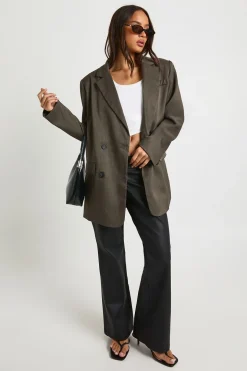 Pantalon évasé à taille en V en synthétique