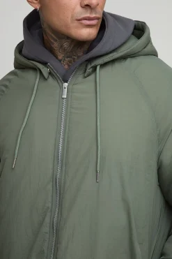 Parka à capuche longue, zippée et rembourrée