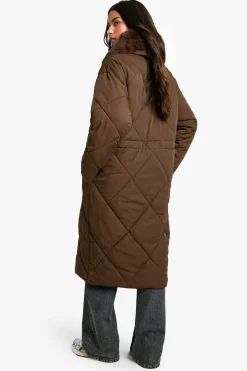 Parka longue matelassée à bordure en synthétique