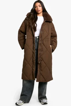 Parka longue matelassée à bordure en synthétique