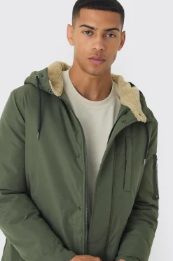 Parka oversize avec capuche doublée en Borg en kaki