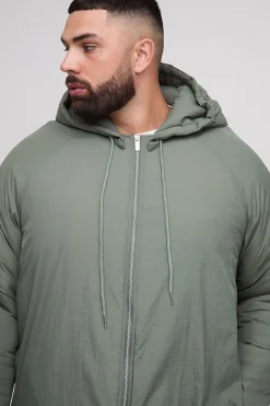 Parka rembourrée à fermeture éclair, coupe longue et capuche