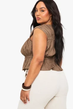 Peplum grande taille à nouer sur le devant en lin rayé
