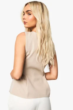 Peplum tissé à fermeture éclair sur le devant