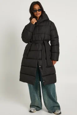 Petite doudoune longue à ceinture