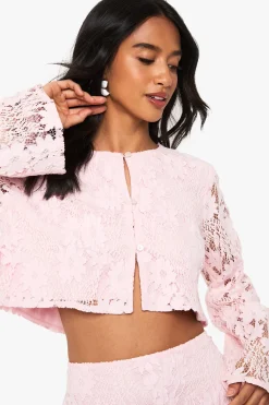 boohoo Petite ensemble coordonné en crochet pour petites tailles : haut à manches longues et mini-jupe<Femme Ensembles
